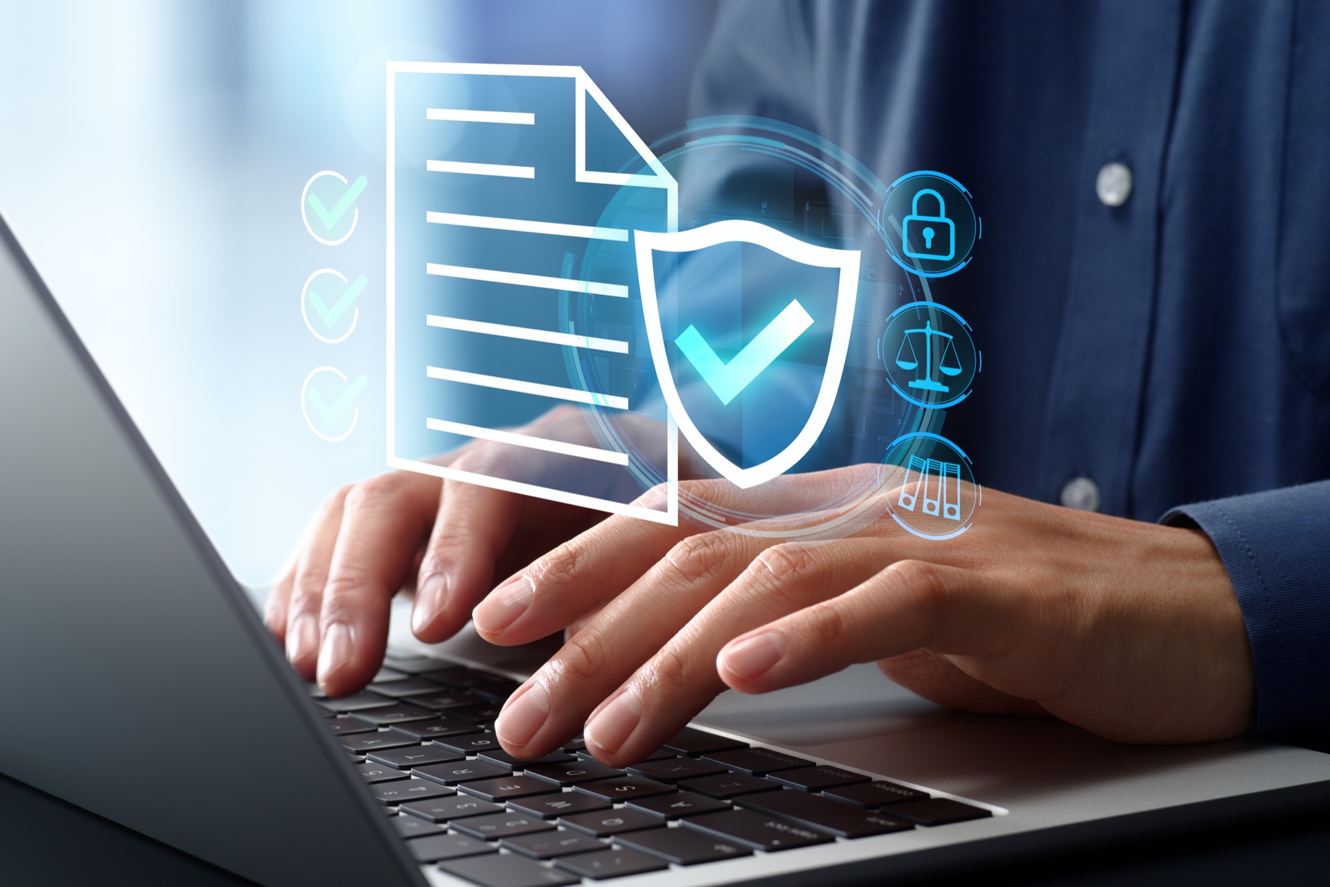 Data privacy and protection graphic over a person using a laptop